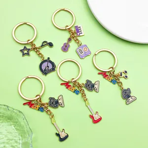 Detailed view of colorful music-themed keychains with guitars and musical notes