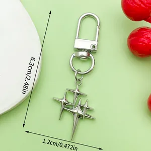 Detailed dimensions of silver alloy star keychain showing 6.3cm height and 1.2cm width