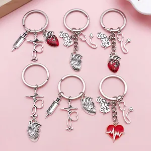 High-quality medical theme keychains featuring heart, stethoscope, and syringe charms.
