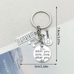 Vintage silver alloy music keychain with musical note, guitar and keyboard charms