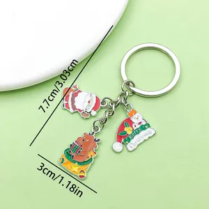 Cute Christmas keychain with Santa Reindeer and Snowman charms measuring 7.7cm