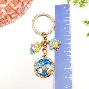 Detail view of creative ocean shell starfish keychain pendant with measurement ruler