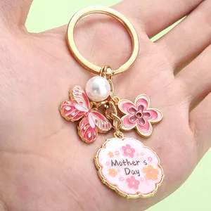 Handmade pink butterfly and flower enamel charm keychain for Mother's Day gift jewelry