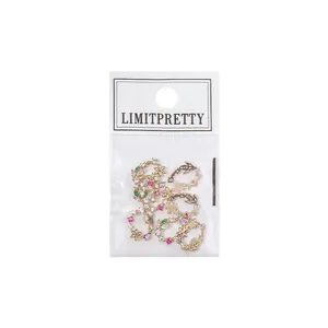 Luxury Christmas zircon nail art charms set with colorful floral designs in packaging