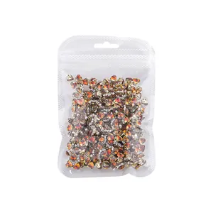 Brown Maillard style nail art rhinestones and pearl charms in bulk pack for DIY manicures.