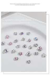 Macro detail of exquisite mini pile diamond nail art charms with pearls and crystals