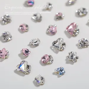 Sparkling assorted heart and star shaped nail art rhinestones with elegant pearl accents