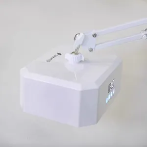 Close-up of 36W LED nail lamp showing adjustable swing arm and digital timer interface.