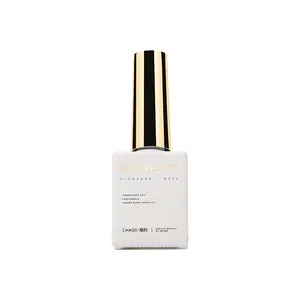 Vernis à ongles gel œil de chat universel en flacon blanc avec bouchon doré.