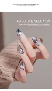 Detailed macro view of marble effect nails created with professional halo dyeing liquid.