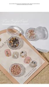 Macro detail of Maillard style nail art pearls in mixed sizes and high gloss finish.