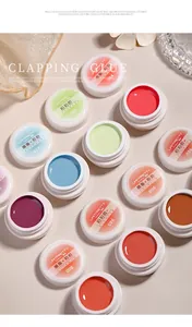 Detailed macro view of colorful nail painting gels for gradient and salon nail art.