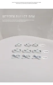 Close-up detail view of ballet style pearl bow nail art charms in various sizes and styles