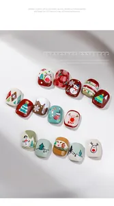 Close-up of 3D embossed Christmas nail stickers with snowman and reindeer designs