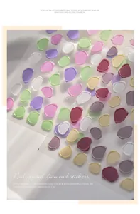 Close-up detail of 3D embossed macaron color nail art stickers with wax seal effect