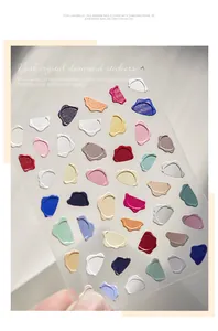 Detailed macro shot of 3D embossed wax seal nail stickers in various macaron colors