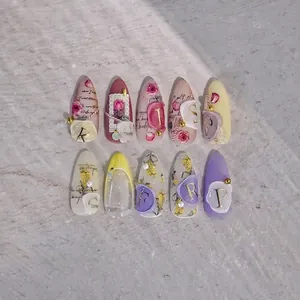 3D embossed floral nail stickers with macaron wax seal designs and gold letters
