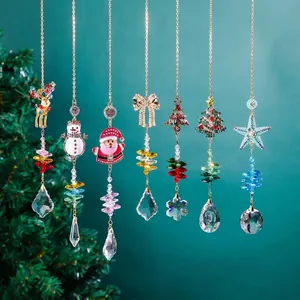 Lot de sept attrape-soleil de Noël en cristal avec Père Noël et motifs de rennes