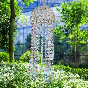 Detailed view of shimmering AB colored crystal suncatcher with rainbow reflections.