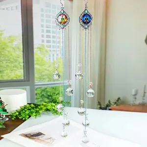 Detail of crystal suncatcher with 7-color chains and five faceted spheres for garden decor