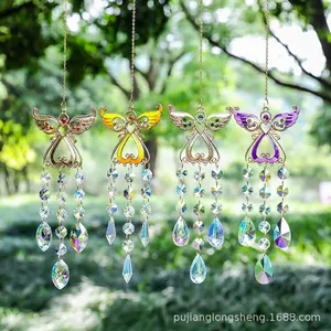 Detailed view of angel wing sun catchers with colorful crystals for garden decor.