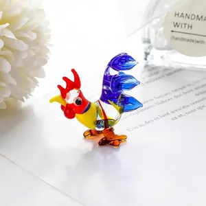 Close-up of a colorful handmade glass rooster figurine as a miniature decor