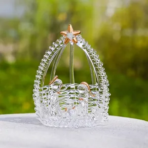 Exquisite detailed view of a glass nativity figurine with gold star and elegant accents.