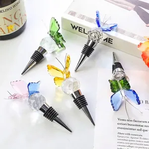 Macro view of multiple colorful crystal butterfly wine stoppers arranged on an elegant lifestyle background