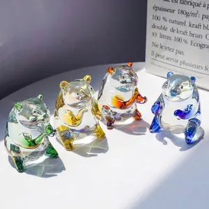 Group of iridescent crystal hamster figurines with colorful gradient glass finish.