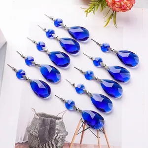 Macro detail of royal blue crystal teardrop pendants for DIY chandelier and curtain decor