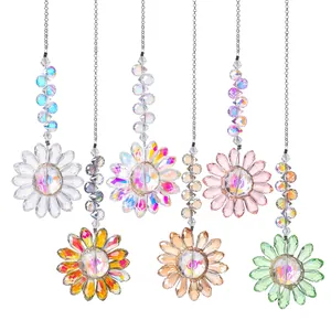 Six colorful faceted crystal sunflower suncatchers with AB coating in a detail shot.