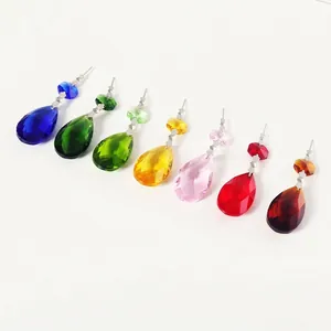 Detail view of seven colorful faceted crystal teardrop pendants for DIY home decor