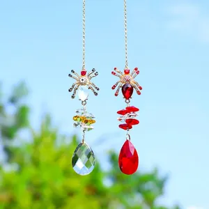 Exquisitos atrapasoles de cristal de araña para Halloween en rojo y blanco para el jardín
