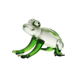 Detailed view of a handcrafted green and clear crystal glass frog figurine ornament.