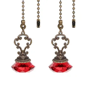 Elegant antique bronze ceiling fan pull chain with faceted red crystal diamond pendant
