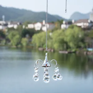 Elegant crystal suncatcher pendant with chandelier design for outdoor garden decor.
