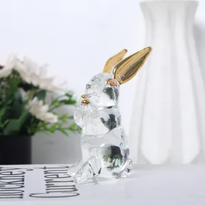 Figurine de lapin en verre soufflé à la main avec oreilles dorées pour décor de luxe