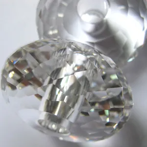 Close-up of faceted clear crystal abacus beads for elegant lighting and chandelier decor.