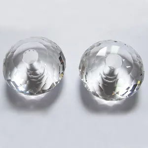 Detailed macro view of faceted clear crystal lamp accessories in abacus bead shape