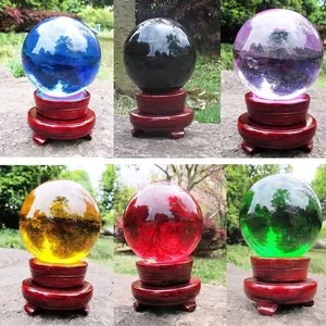 Detailed view of 90mm colored crystal glass balls in six vibrant hues for home decor.