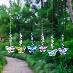 Colorful crystal butterfly suncatchers sparkling in a lush garden setting