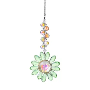 Close-up of sparkling green crystal sun flower catcher with iridescent AB plated center