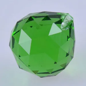Close-up of a 4cm green faceted crystal ball chandelier pendant for DIY lighting