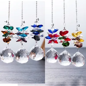 Detailed view of six colorful faceted crystal ball hanging pendants for home decor