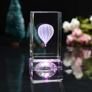 Macro view of 3D laser engraved hot air balloon inside a clear crystal cube block