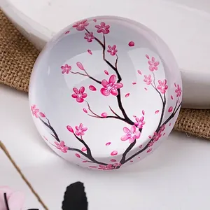 Presse-papier décoratif en cristal demi-sphère avec imprimé fleurs de cerisier