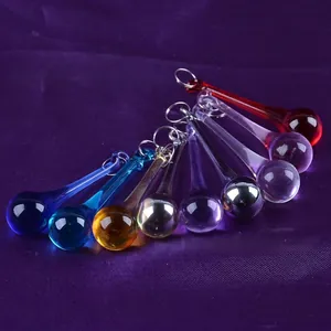 Detailed view of multi-colored crystal teardrop pendants for lighting and wedding decor