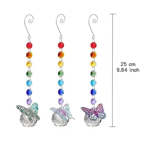 Detail view of rainbow crystal bead suncatcher with metal butterfly and length marker.