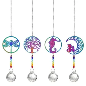 Detailed view of suncatchers with dragonfly, tree of life, seahorse, and moon motifs