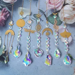 Detailed macro view of seven colorful AB crystal suncatchers with gold metal accents.